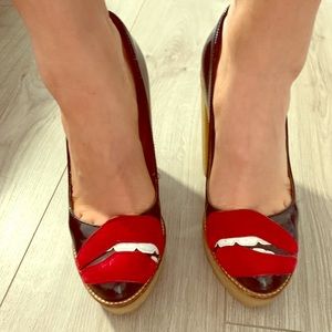 Best deal for Red Valentino lip heels 👠